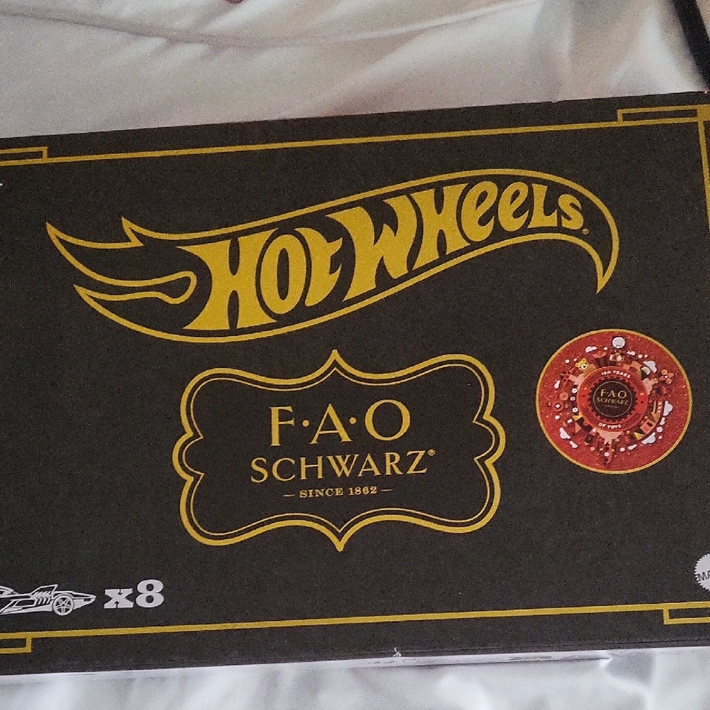 Hot Wheels FAO Schwarz Black and Gold Set